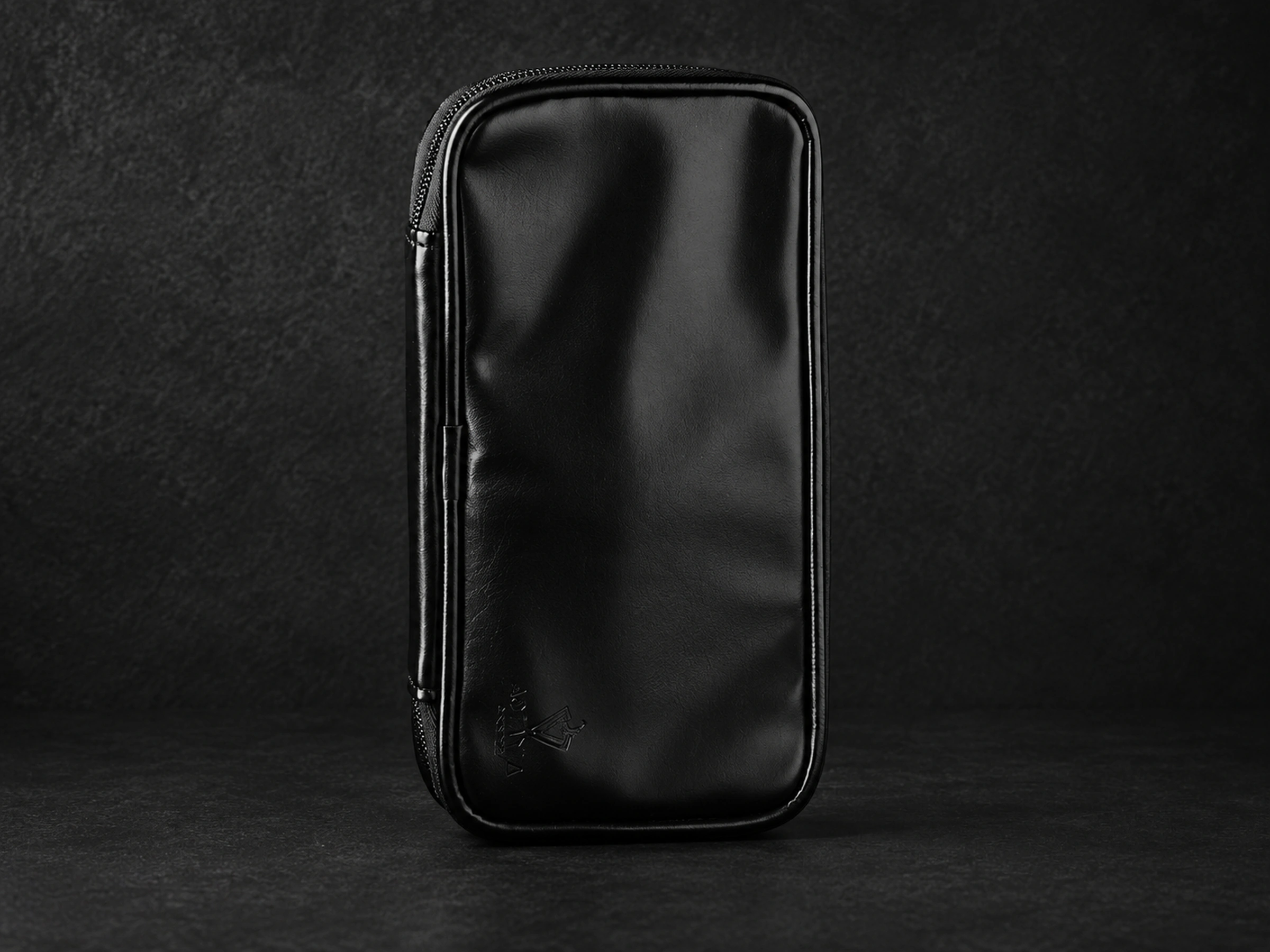 The included long rounded rectangular black zippered brush pouch