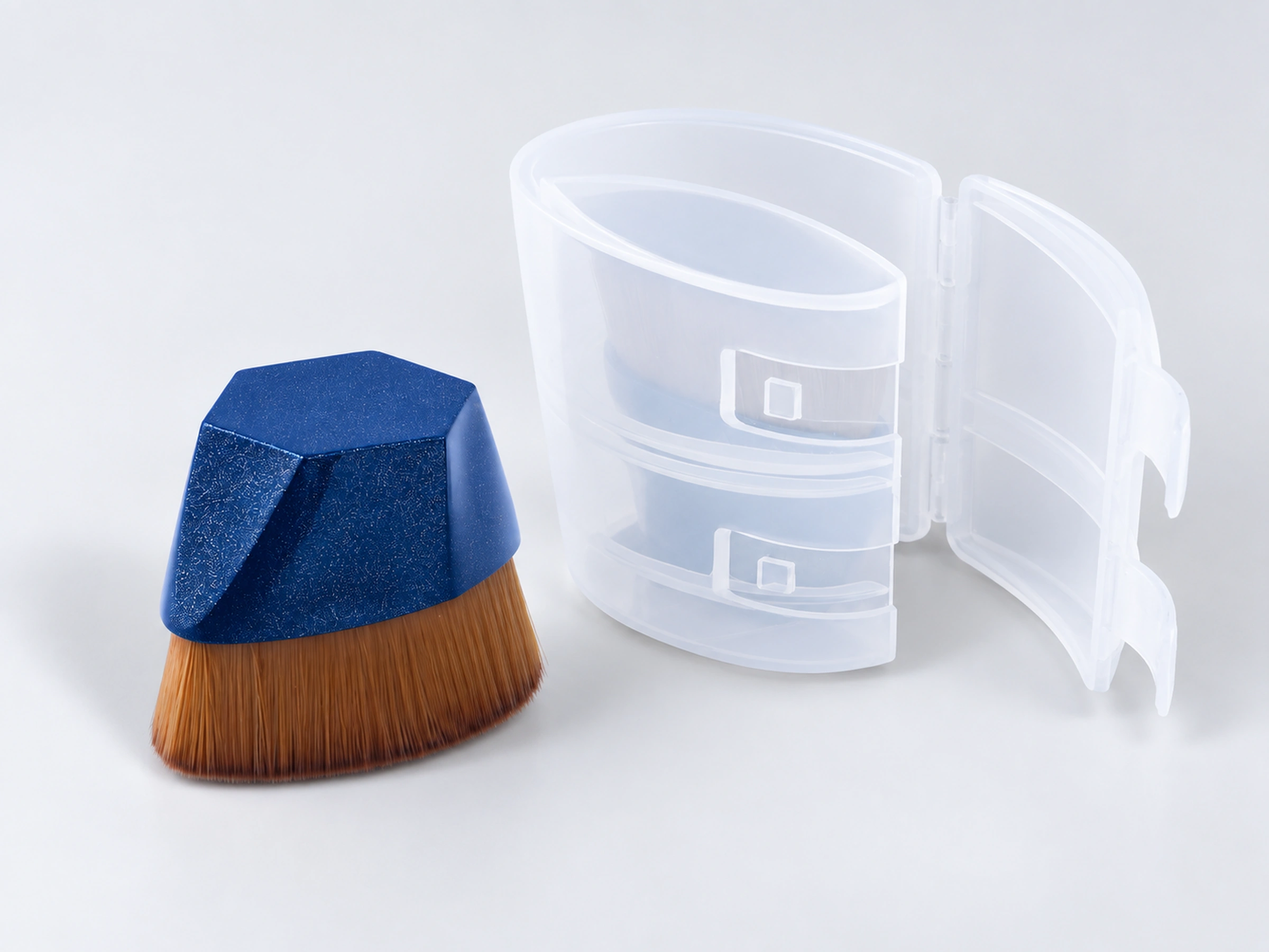 No.55 blue foundation brush beside its open translucent hinged storage case