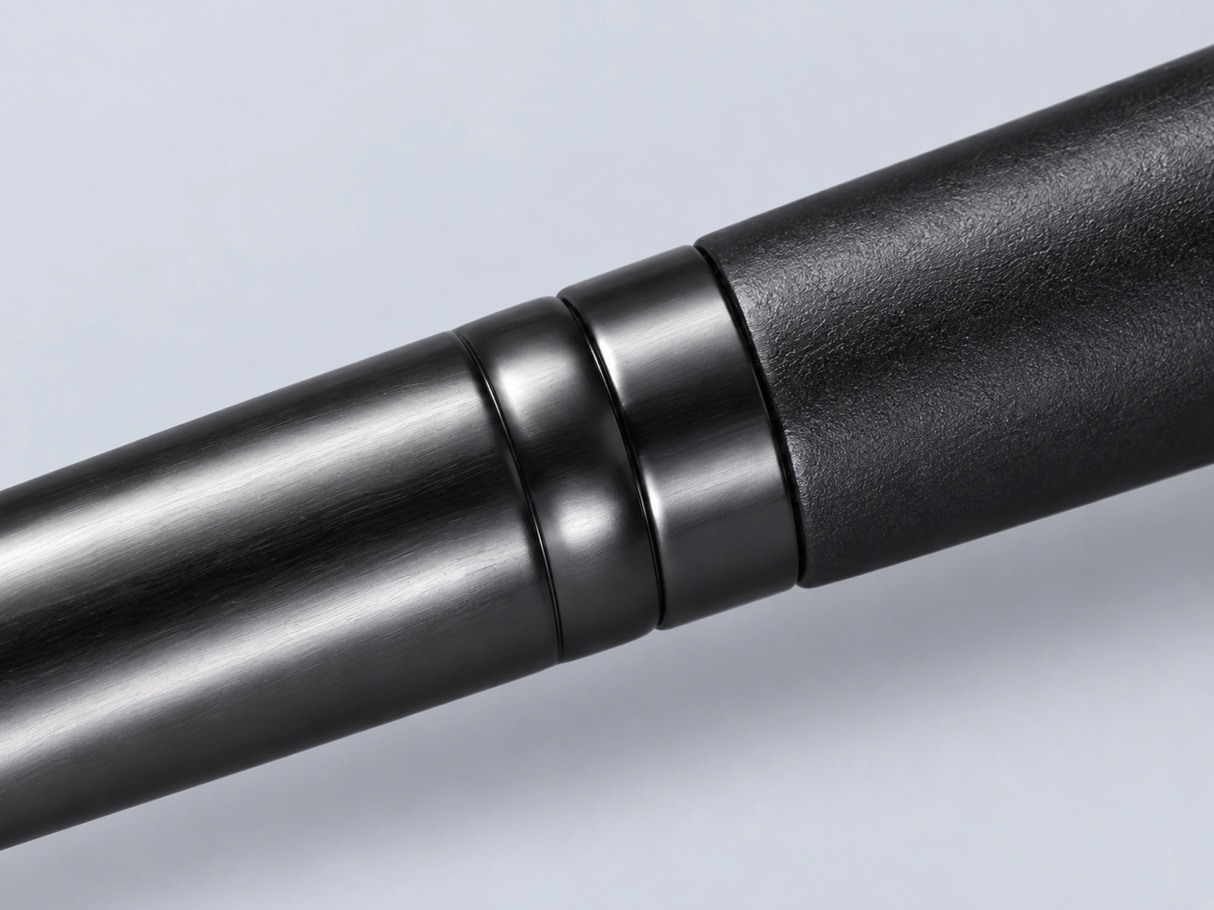 G5522 twin black copper collar bands meeting the matte black solid-wood handle