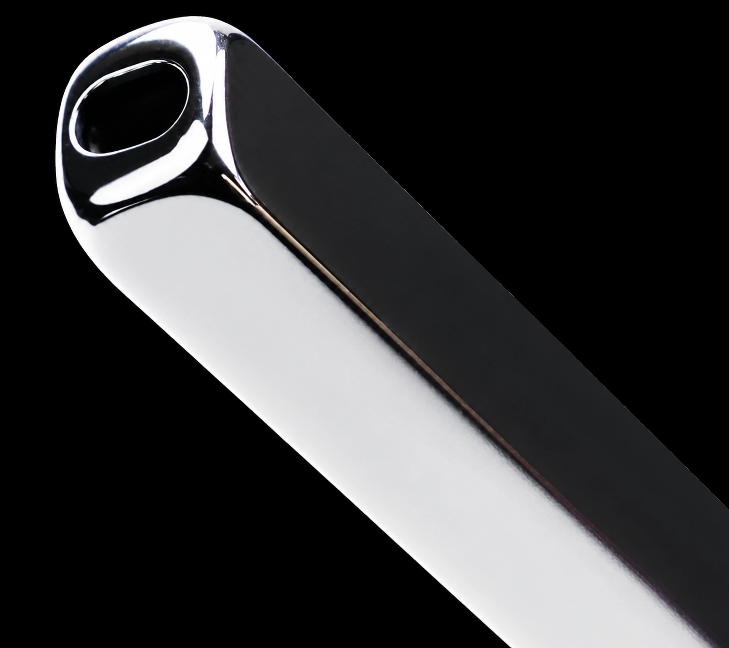 Closeup of the silver rectangular case integrated opening with the brush retracted
