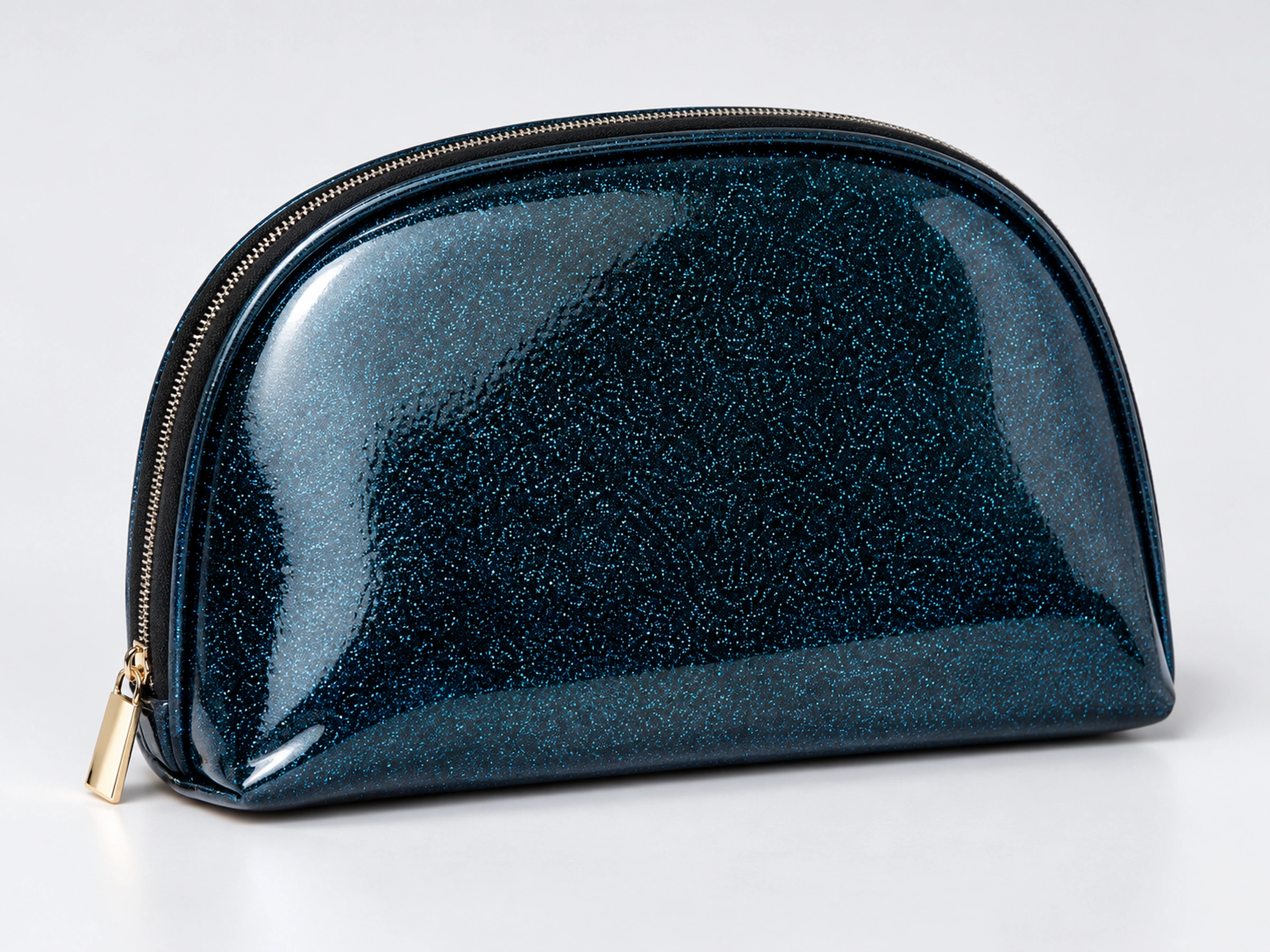 The single dark blue pearlescent zippered storage pouch included with the nine-piece brush set