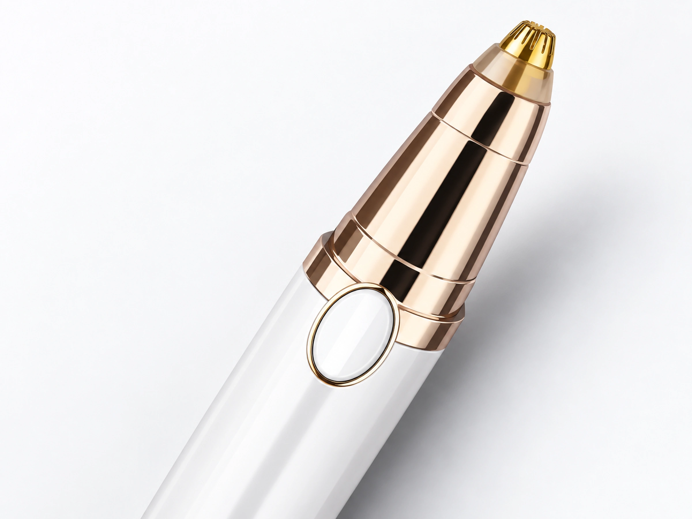 Original white eyebrow trimmer with its small gold-tone slotted tip and polished upper assembly