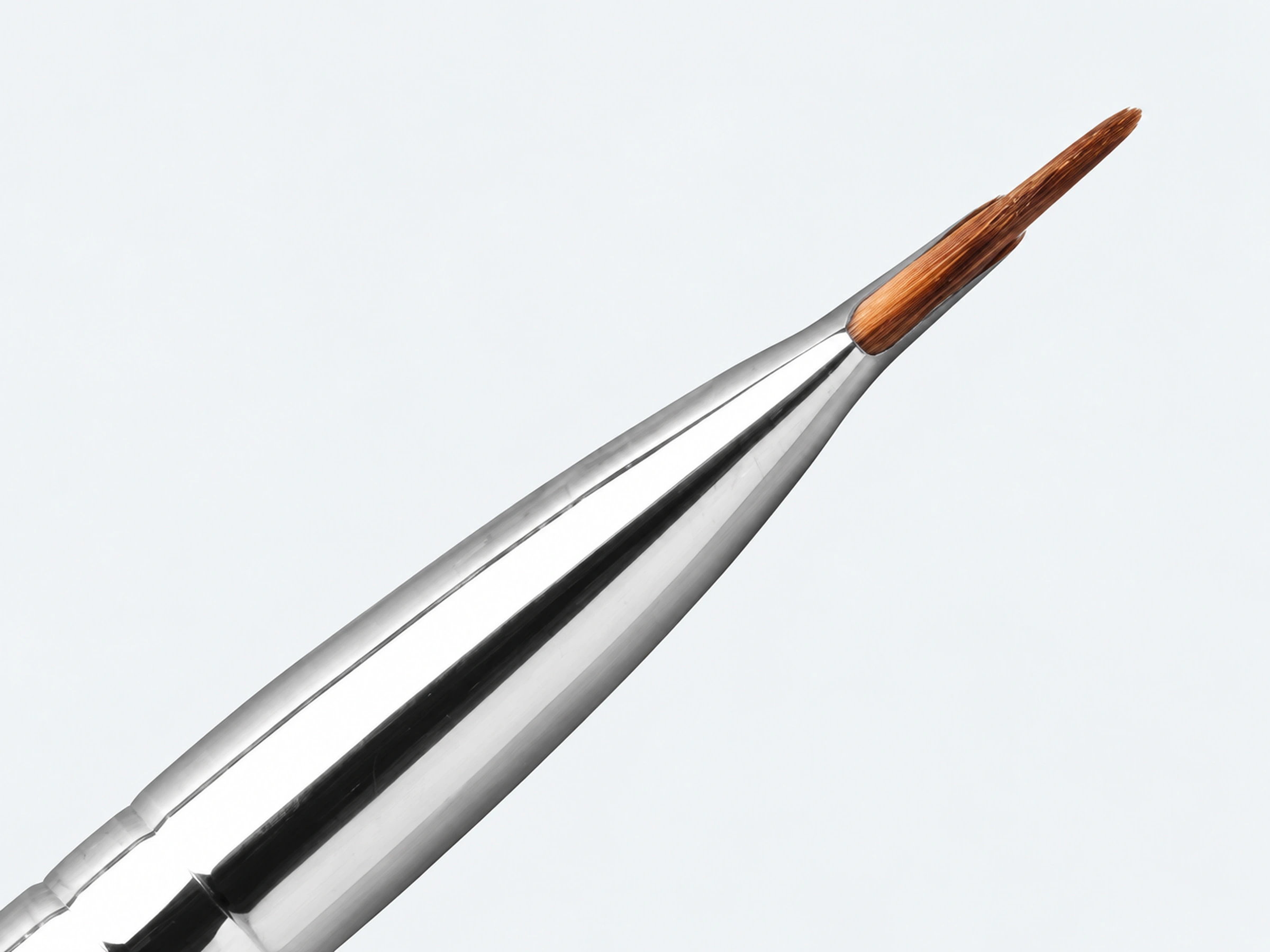 Side-view macro of the fine brown A2304 brush edge and reflective silver ferrule