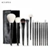 AOLANLA Black 13-Piece Brush Set with black storage roll, complete set on white