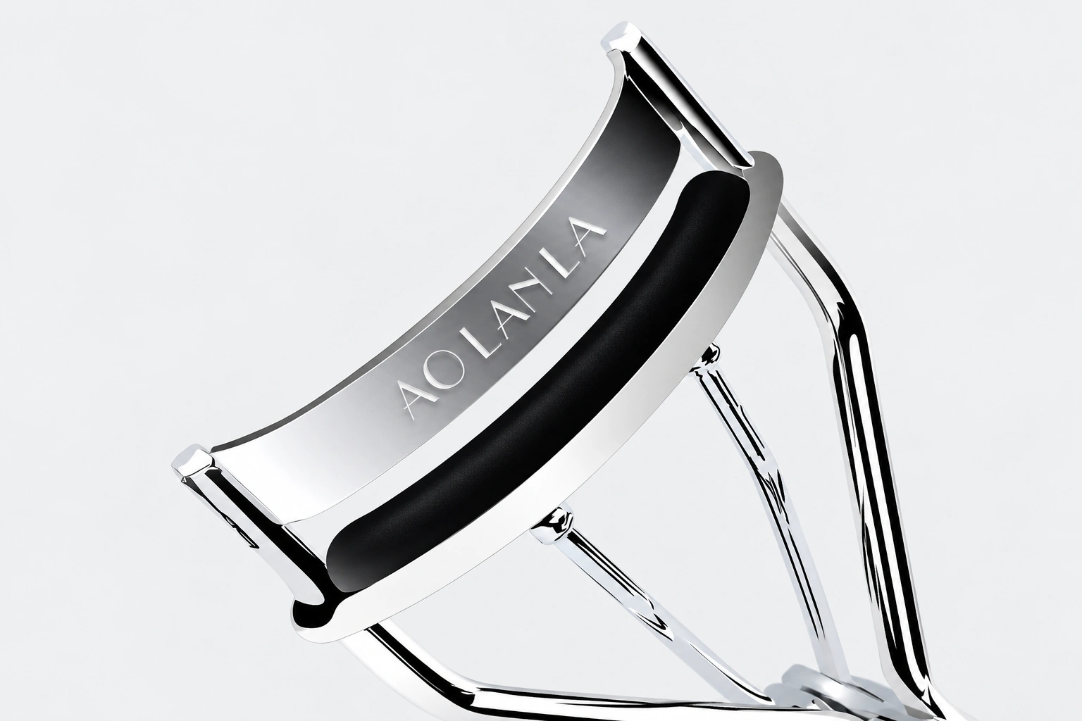Close-up of the complete curved silver jaw and black curling pad
