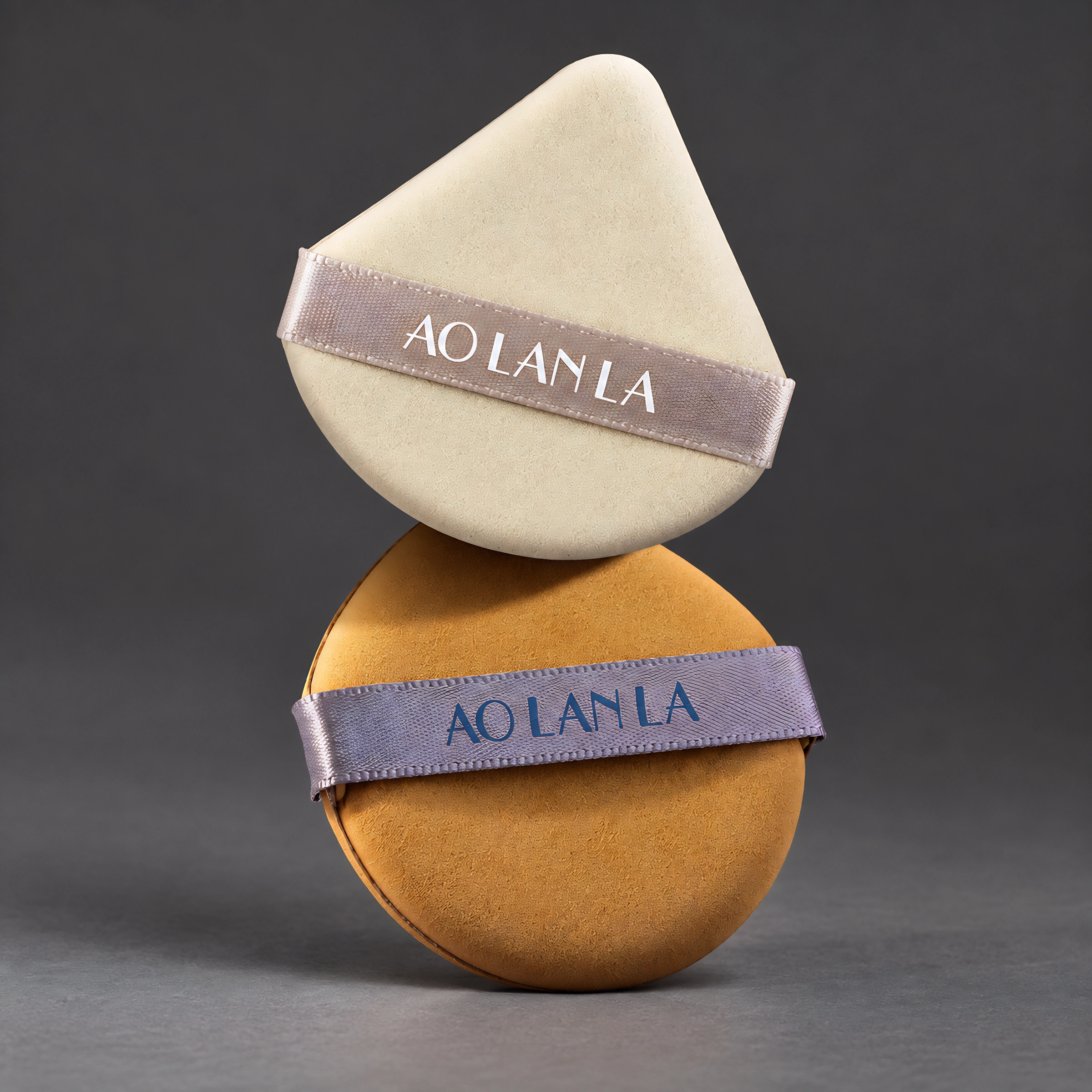 Pale curved triangle and ochre teardrop puffs showing their application shapes
