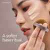 Applying foundation with the ochre puff
