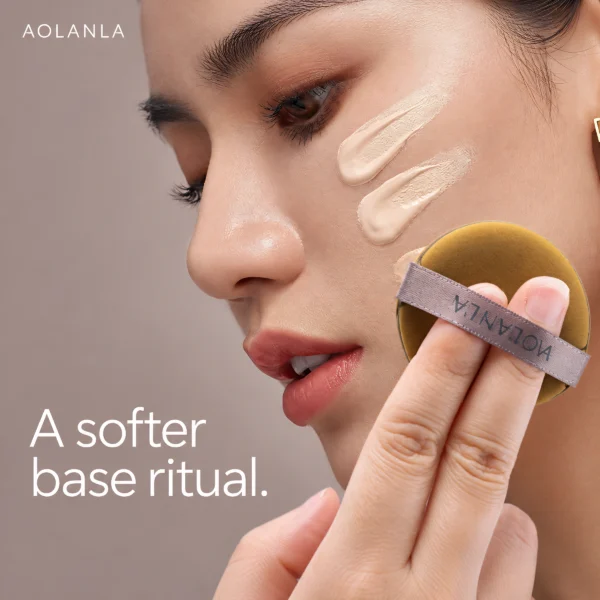 Applying foundation with the ochre puff
