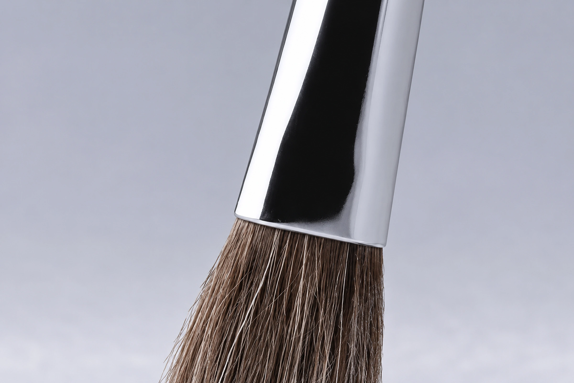 Close-up of the No.13 horse-hair fibres meeting the polished silver-tone metal ferrule