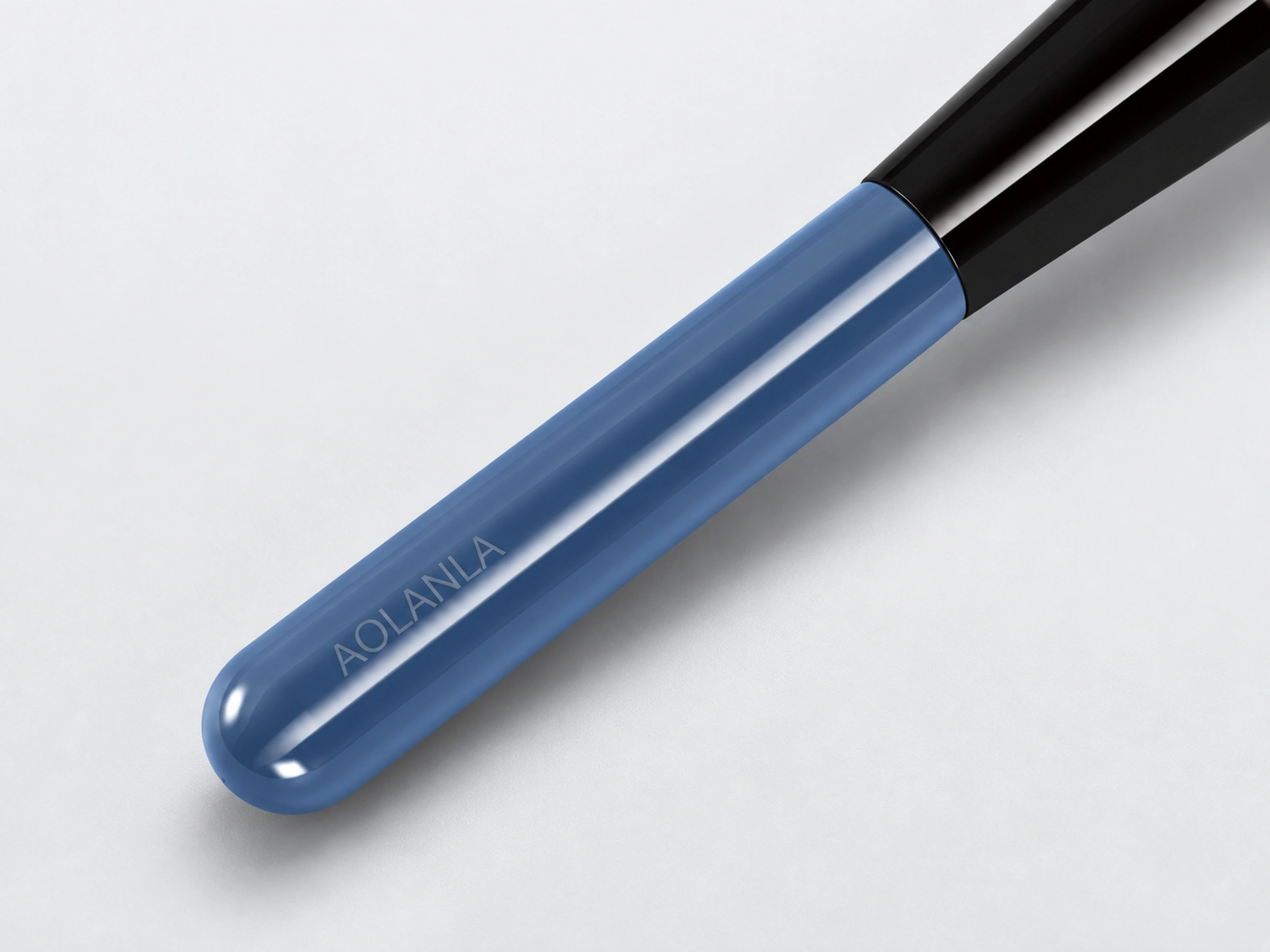 Original No131 rounded blue grip meeting the tapered glossy black junction