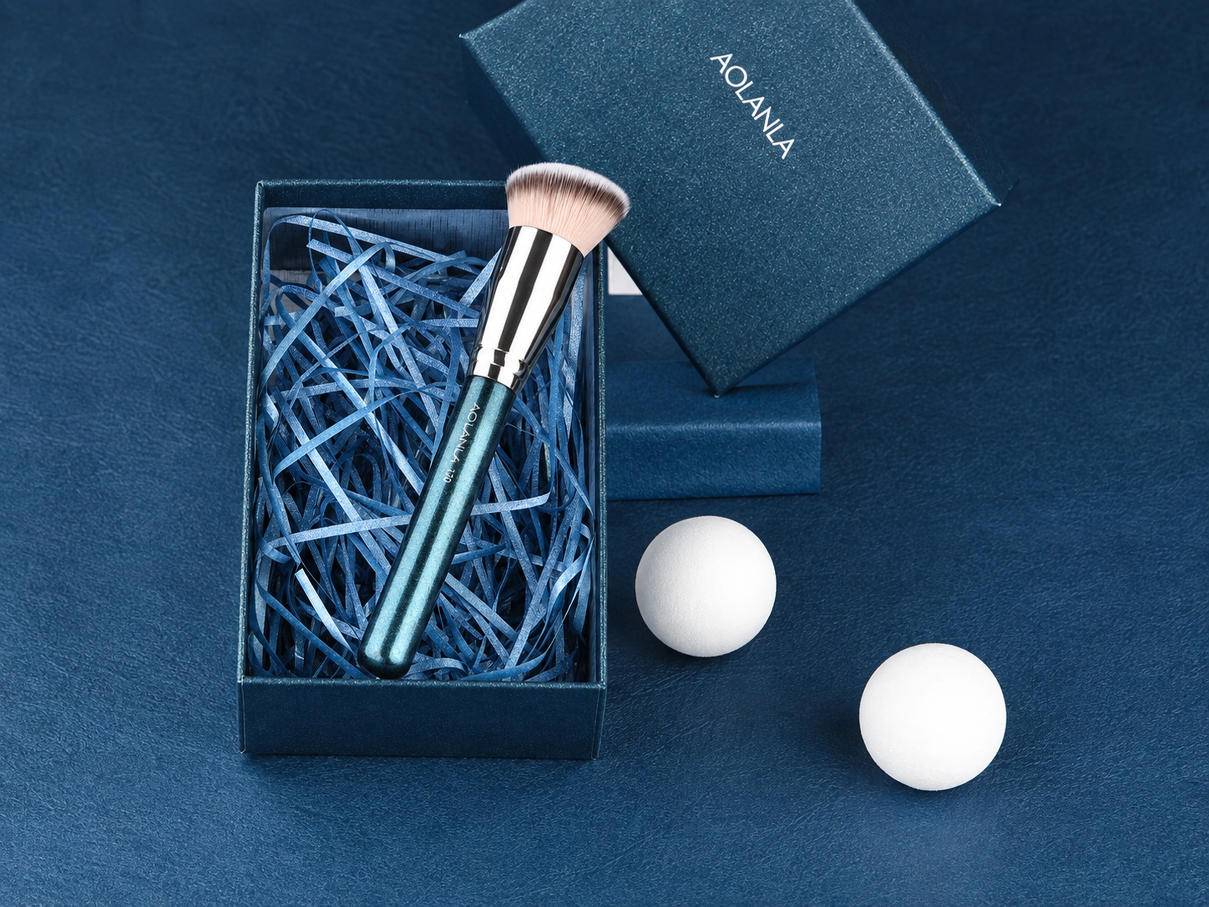The real single No170 foundation brush in its original blue presentation box with blue packing paper