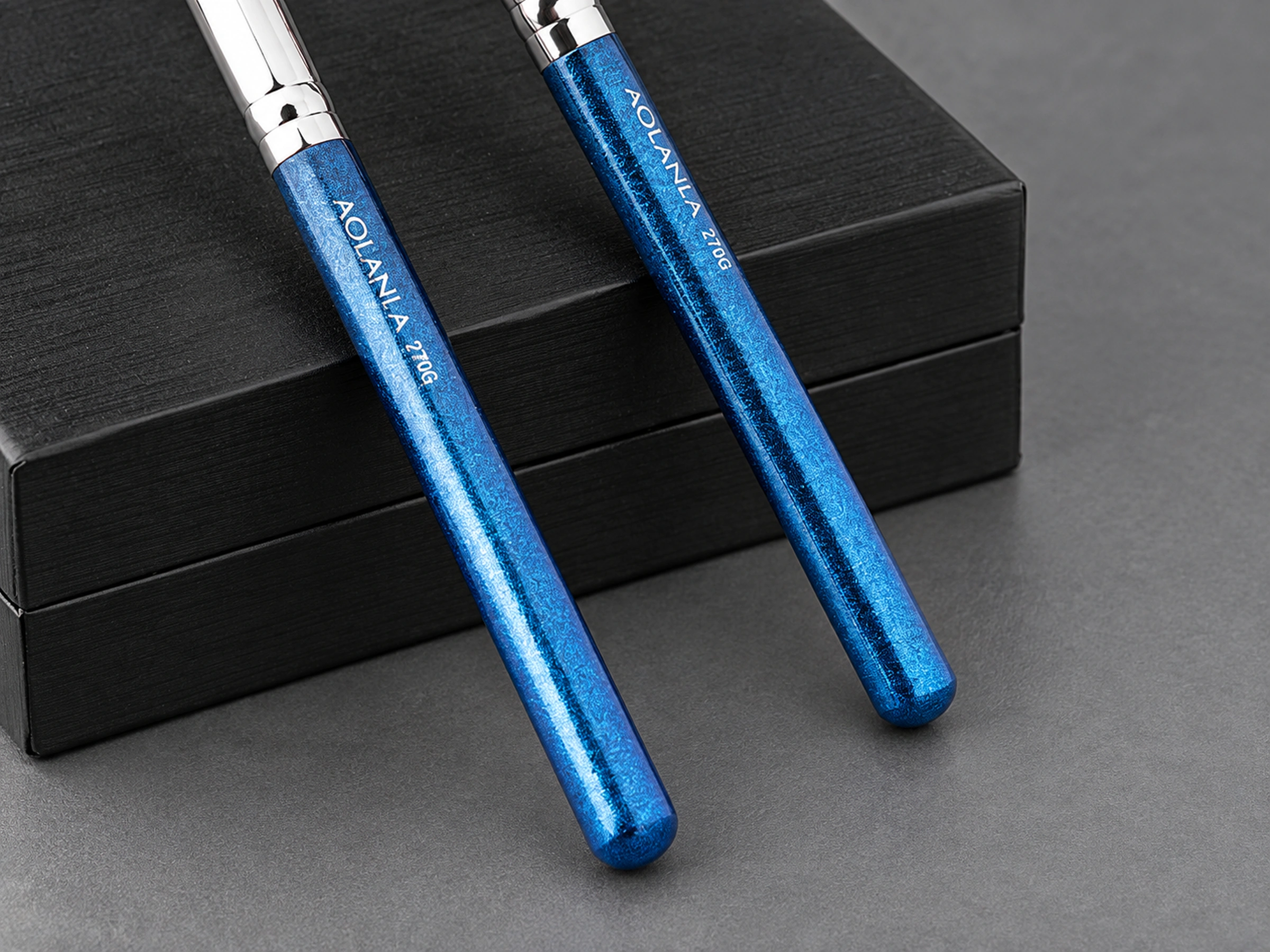 Original 270G blue pearlescent grip ends, two styling views of one included brush