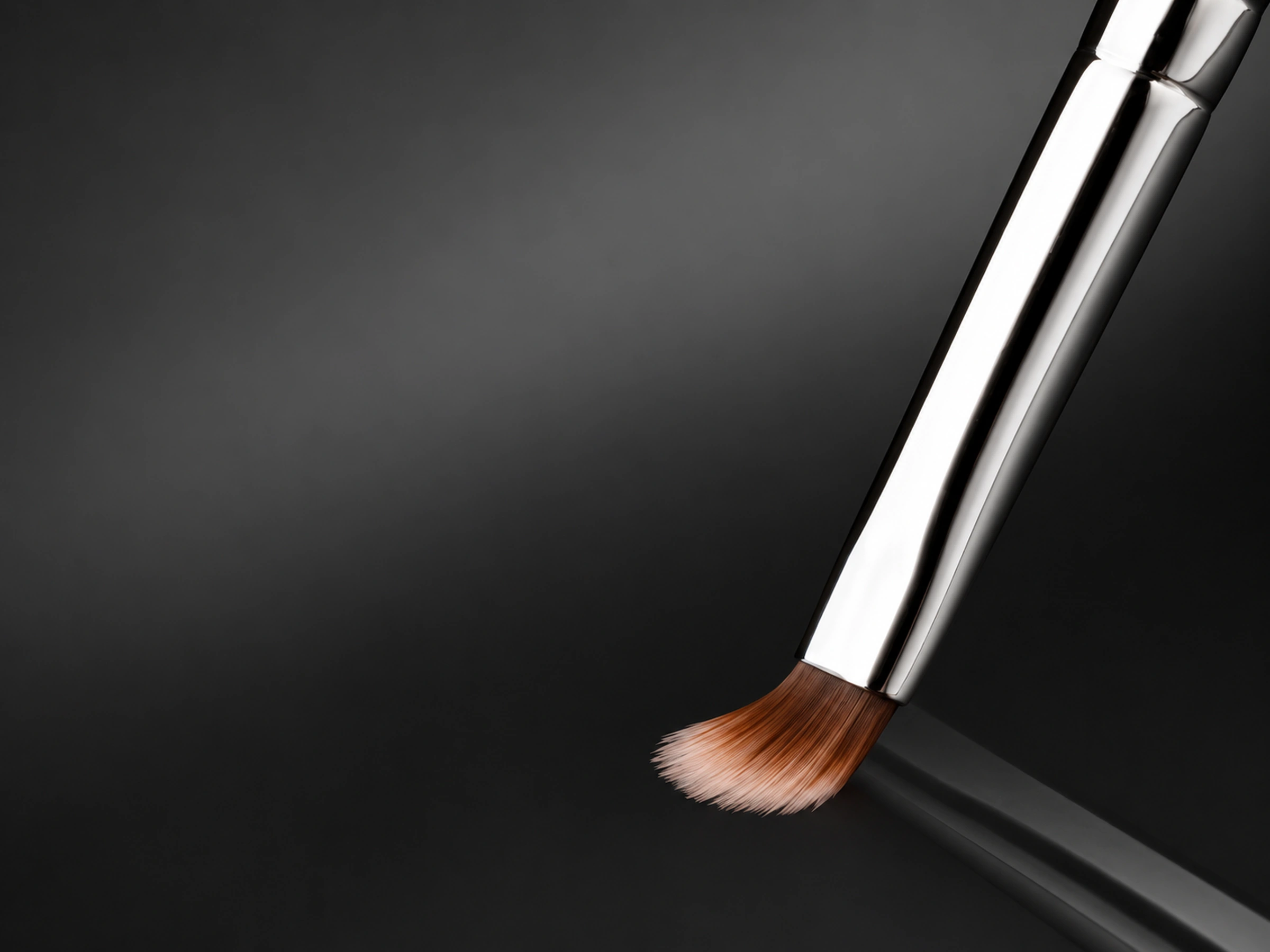 Actual No.8 brown-to-cream fibres flexing lightly against the dark surface under light contact