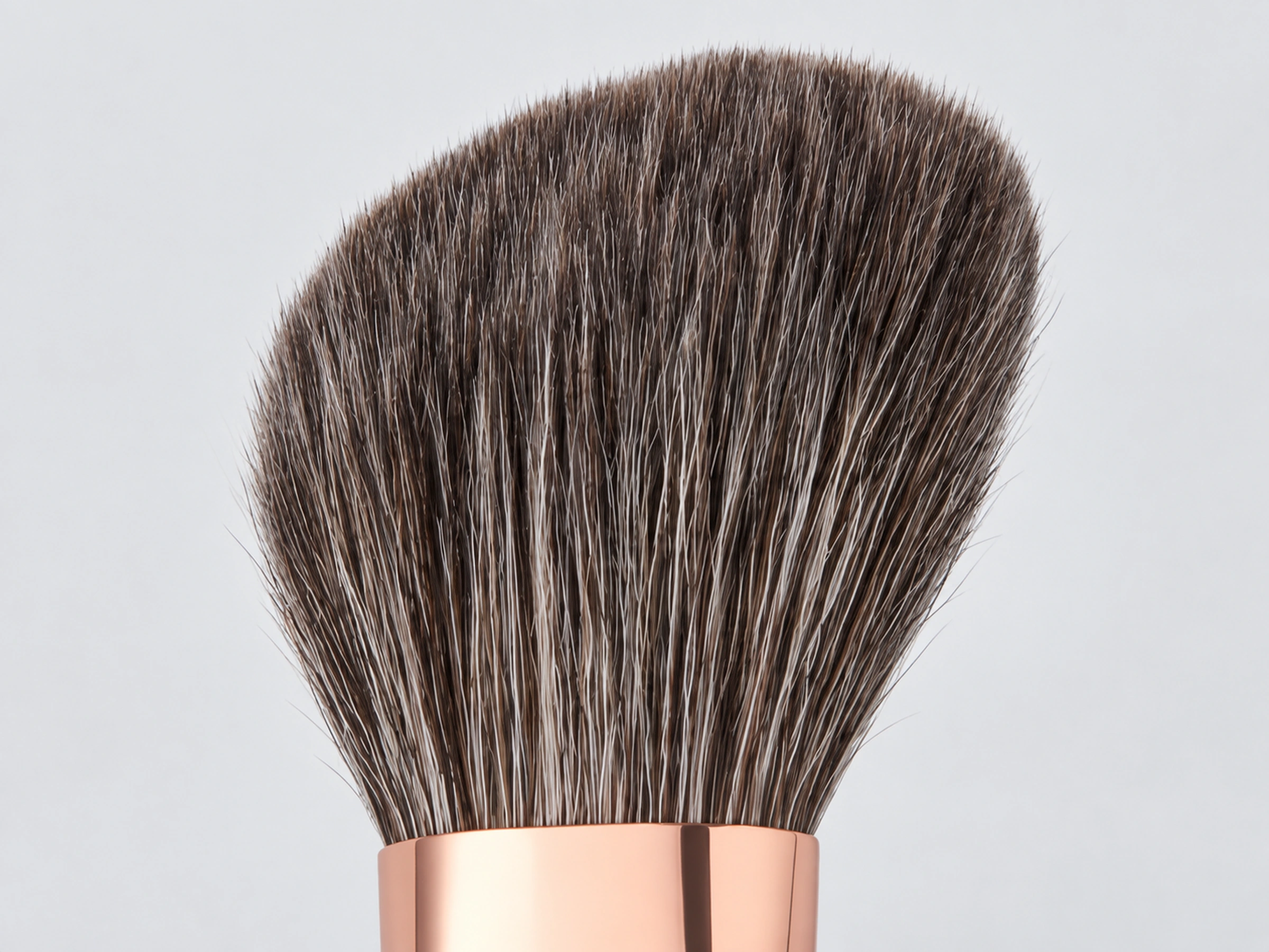 Natural grey-brown fibre texture and real rose-gold ferrule from the Emerald collection