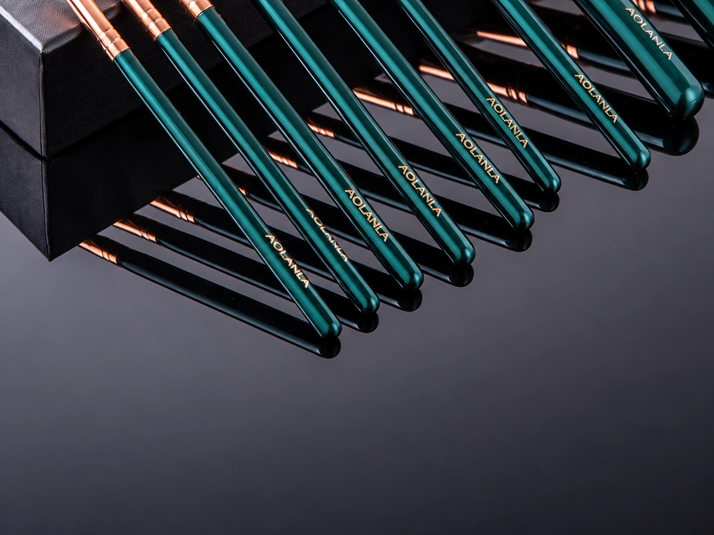 Exact glossy emerald green grip ends and rose-gold plated metal sections from the collection