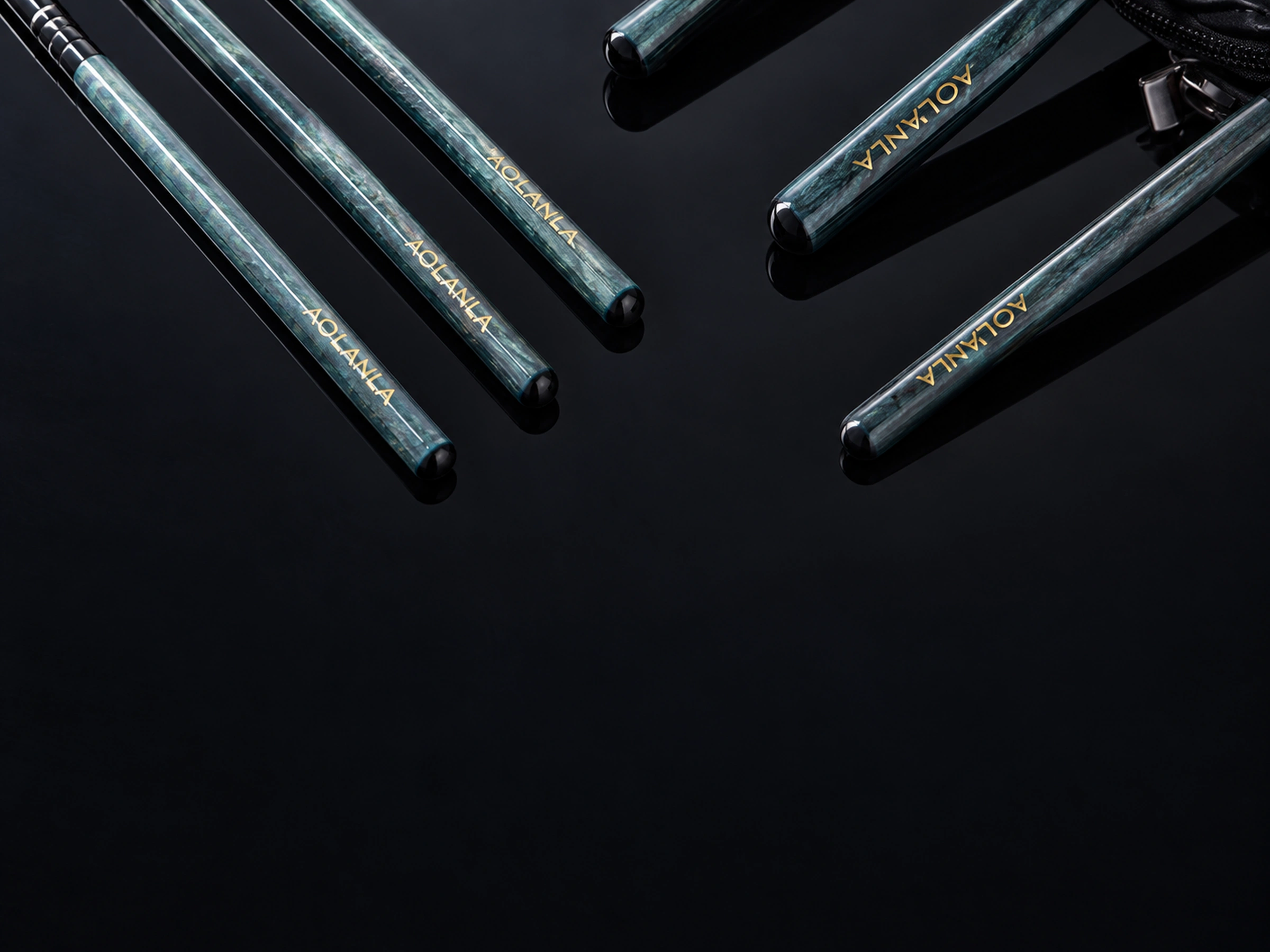 Original pearlescent peacock-blue grip ends over charcoal