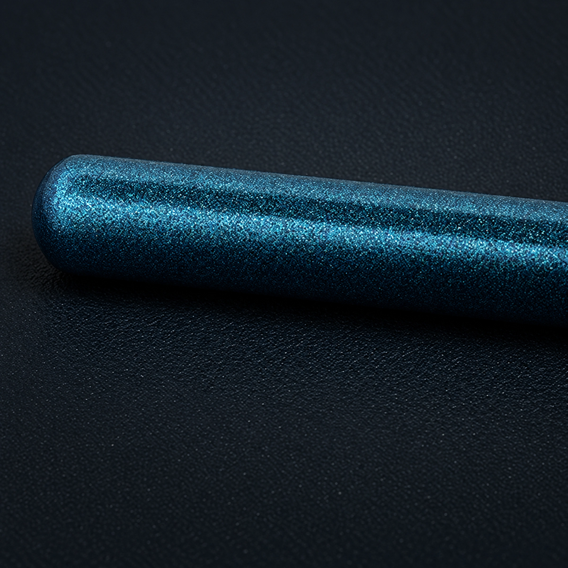 The real rounded blue handle end with its fine pearlescent finish
