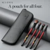 Phoenix four brushes beside their textured black zip pouch