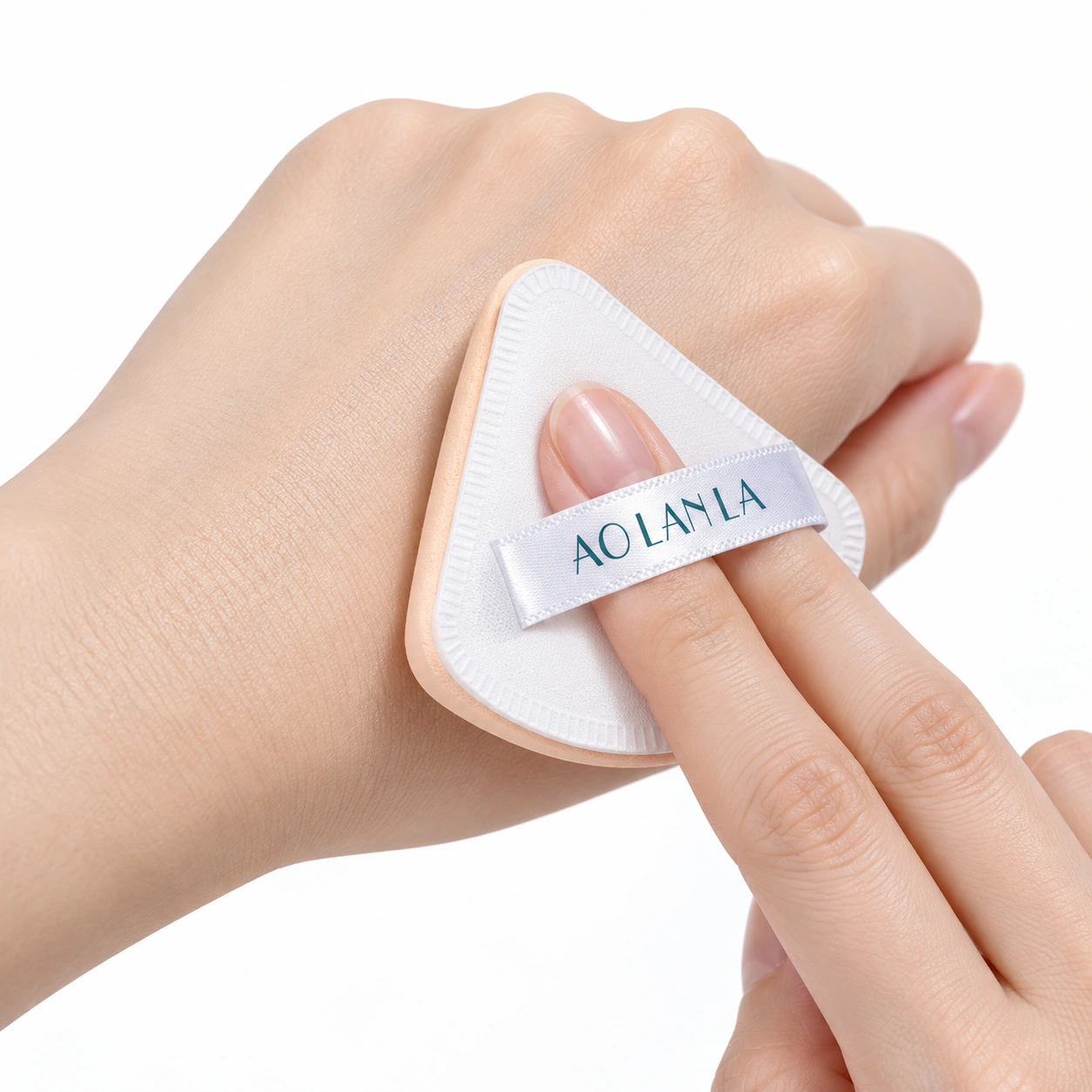 Illustration of light pressing contact with a triangle puff on the back of a hand