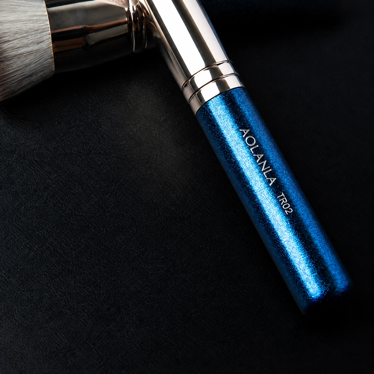 Pearlescent blue TR02 handle and polished silver ferrule