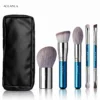 Five AOLANLA travel brushes and black zip pouch on white