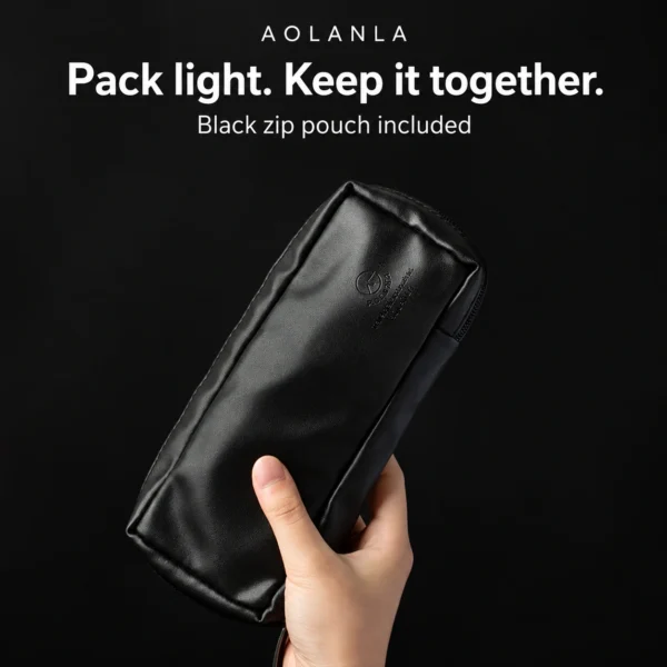 Included black PU zip pouch held in one hand