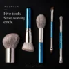 Five complete travel brushes with seven working ends