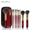 Vermilion Gold nine-piece makeup brush set with zippered pouch