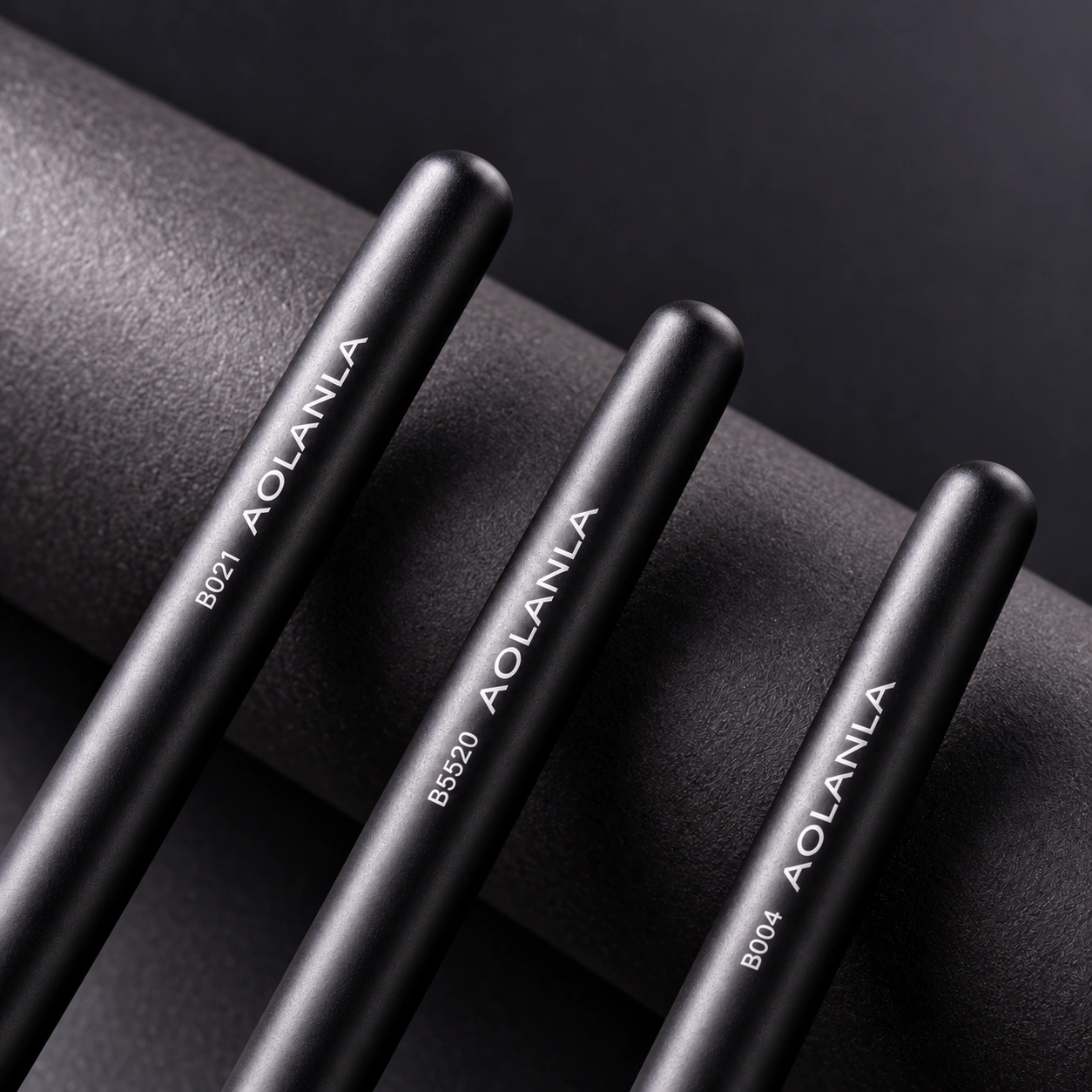 Matte-black solid wood Zhumo brush handles with original model markings