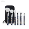Blue Sakura nine-piece brush set and black zip case on white