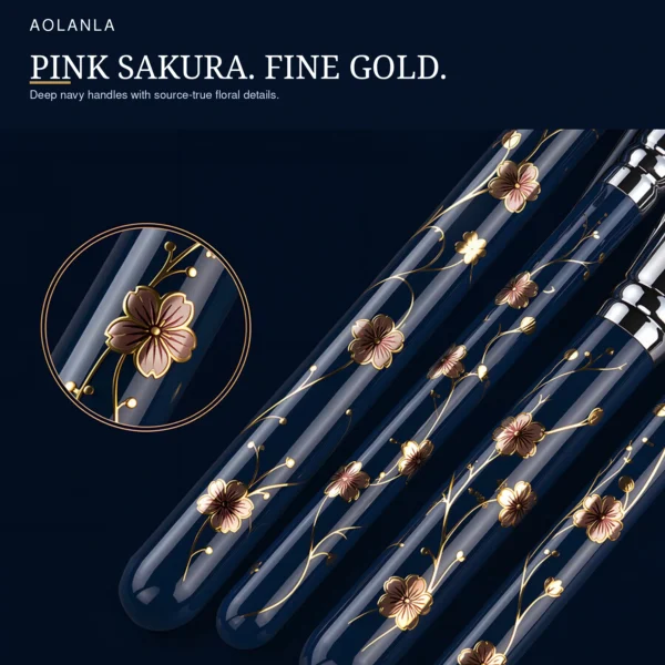 Deep navy handles with pink-centred sakura and fine gold linework