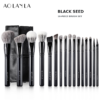 AOLANLA Black Seed sixteen-piece makeup brush set with black wrap pouch on a pure white background
