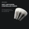 Close detail of the AOLANLA dual-layer angled face brush showing its soft outer layer and supportive inner core