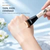 AOLANLA fishtail brush applying a thin even layer of liquid foundation