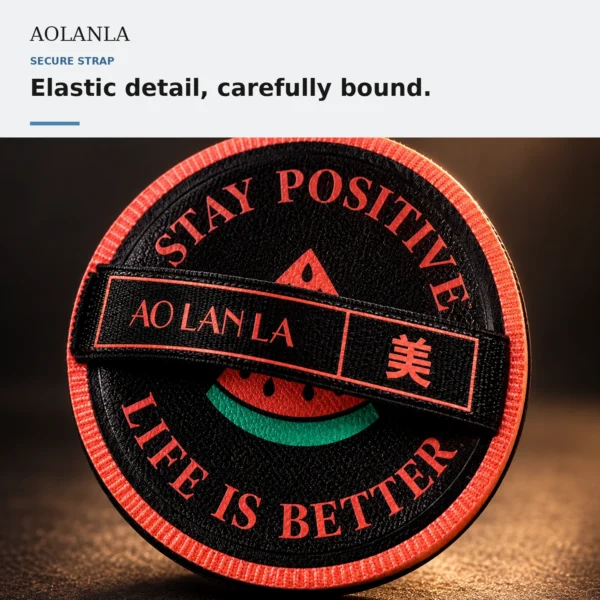 Red round Aurora XL puff showing its bound elastic finger strap