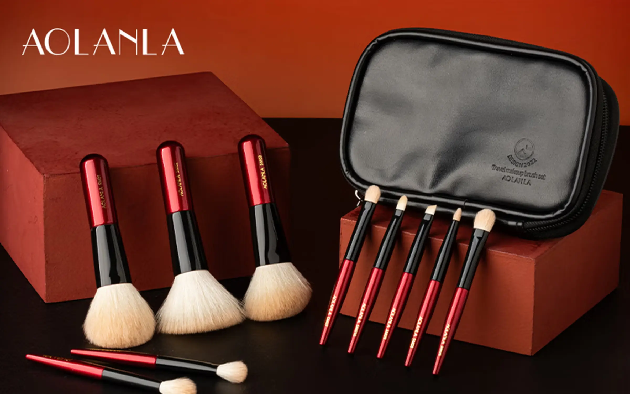 The complete AOLANLA Mini 10-Piece Vermilion Red brush set with its black travel pouch