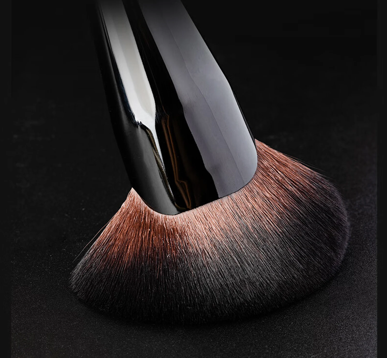 Brush head pressed to show the resilience of bundled hair